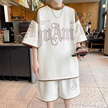 Ensemble sportif extérieur pour hommes composé d'un t-shirt à manches courtes imprimé avec lettres de personnalité et d'un short, respirant, en deux pièces