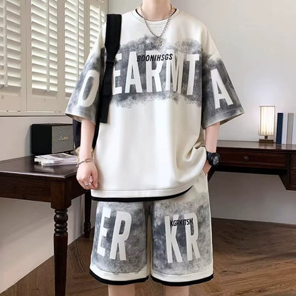 Ensemble sportif extérieur pour hommes composé d'un t-shirt à manches courtes imprimé avec lettres de personnalité et d'un short, respirant, en deux pièces